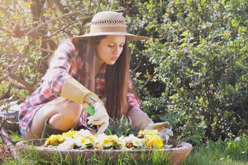 Professional gardeners maintaining a secure outdoor workspace
